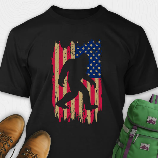 Black bigfoot american flag shirt featuring patriotic grunge background