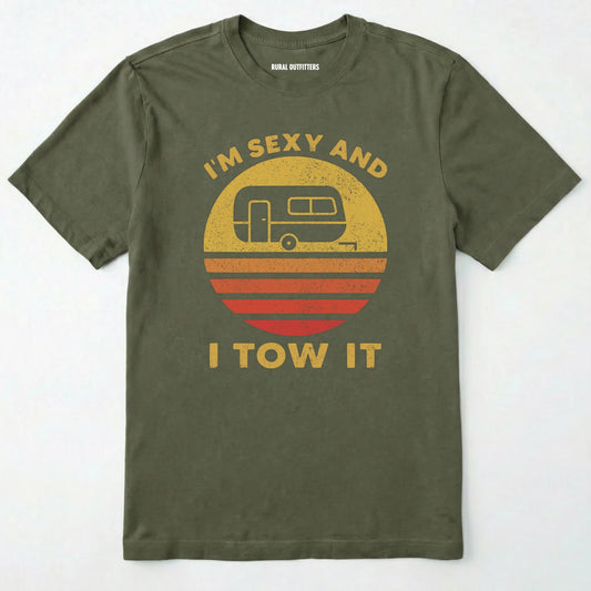 Military Green trailer shirt with retro camper and sunset graphic, and "i'm sexy and i tow it" text on a white background.
