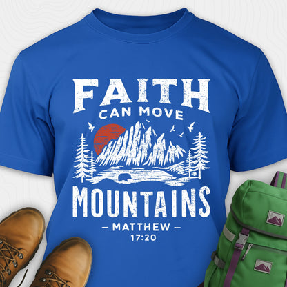 Blue bible verse t-shirt with 'Faith can move mountains' design and hiking boots and backpack on a white background