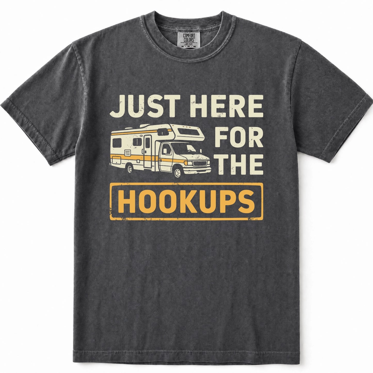 Grey mineral-wash t-shirt with a vintage-style graphic that reads 'JUST HERE FOR THE HOOKUPS' in cream and yellow text, featuring an illustration of a camper van in the center.