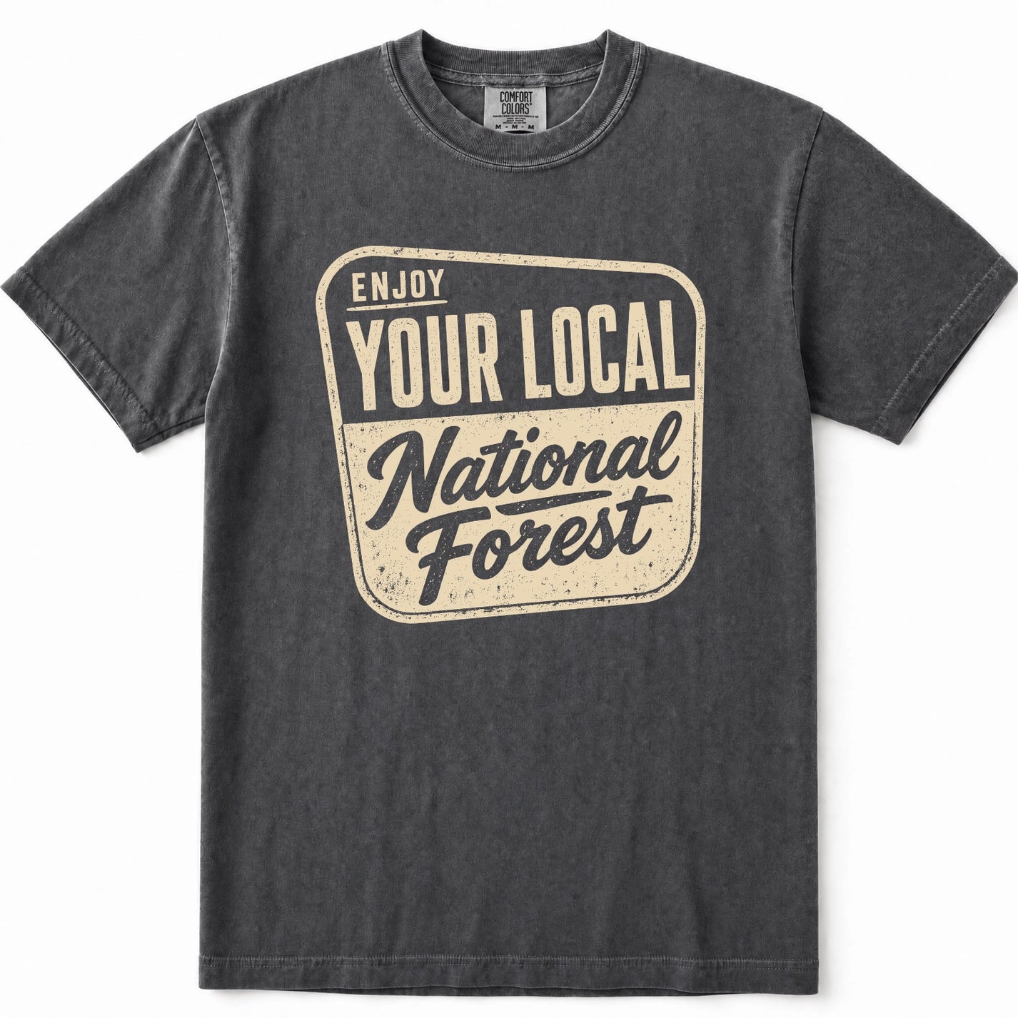 Grey washed short-sleeve t-shirt with a distressed cream-colored graphic on the front that reads 'ENJOY YOUR LOCAL National Forest'.