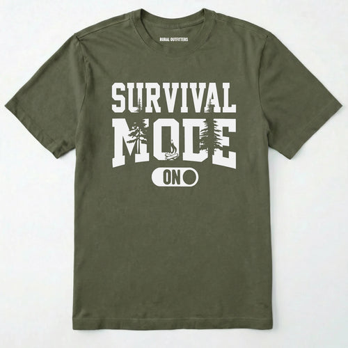 Military Green survival mode shirt with camping-themed graphic and rugged text on a white background.