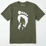 Military Green bigfoot t-shirt with cryptid-themed footprint graphic and sasquatch silhouette on a white background.