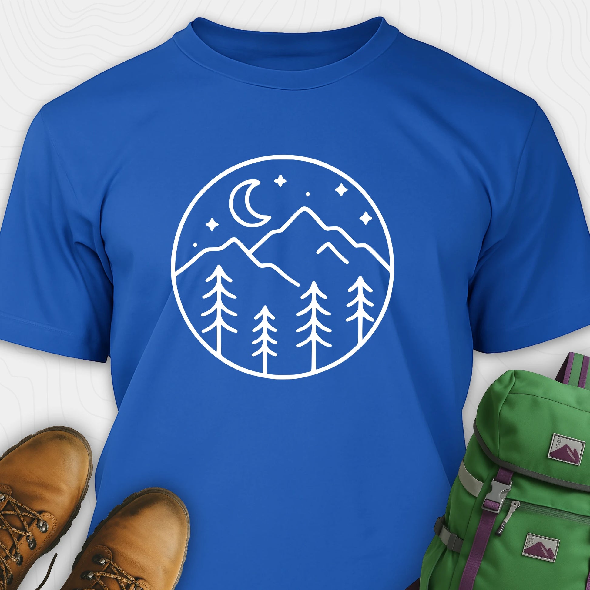 Blue moon and stars shirt with minimalist mountain and forest design