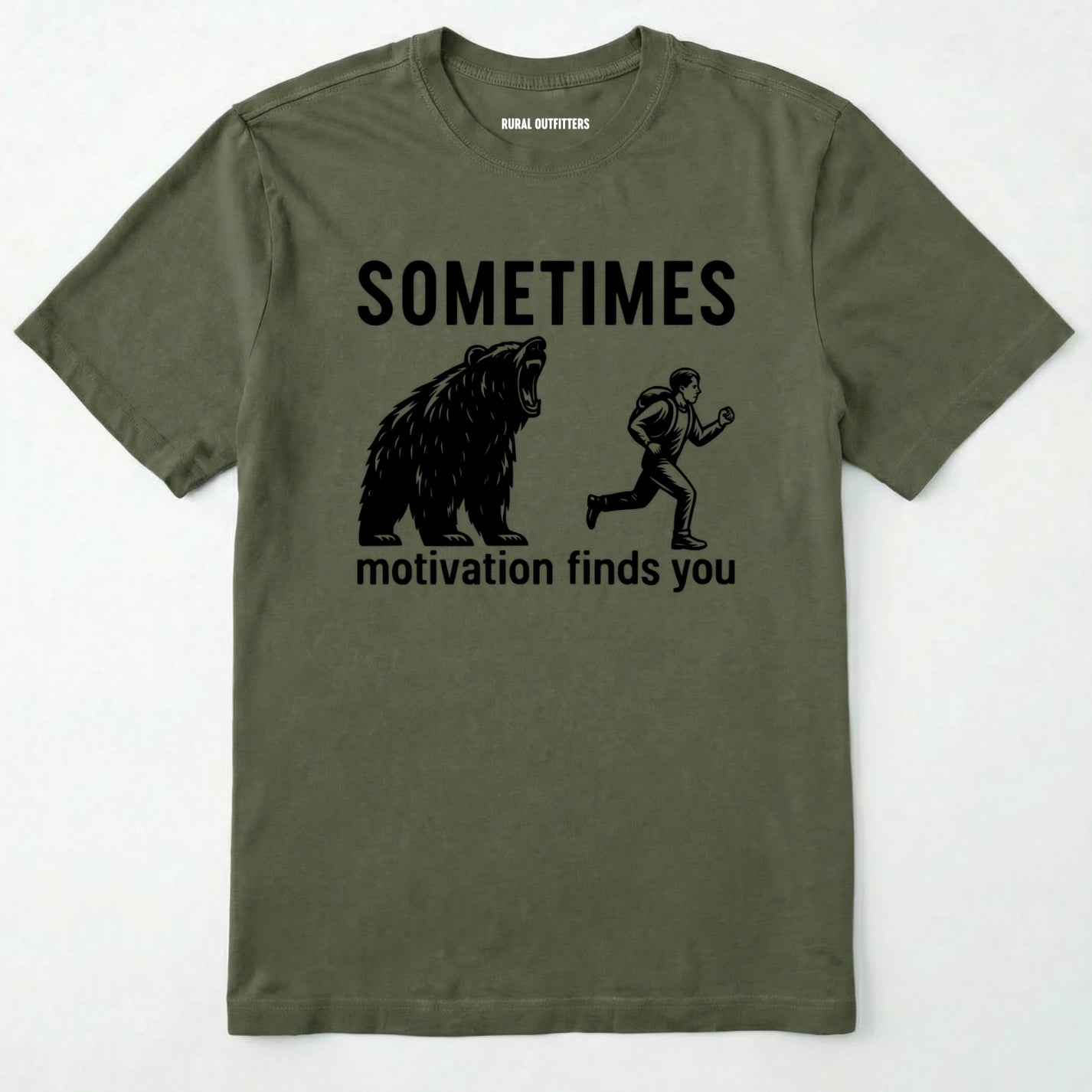 Military Green motivational t-shirt with bear and person graphic and text 'sometimes motivation finds you' on a white background.