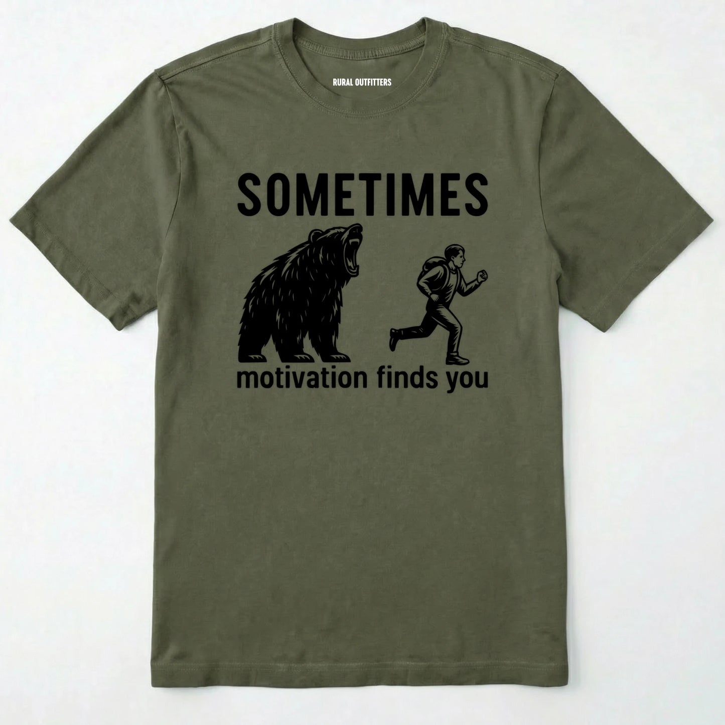 Military Green motivational t-shirt with bear and person graphic and text 'sometimes motivation finds you' on a white background.