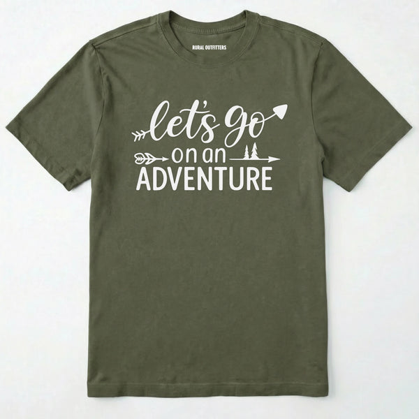 Military Green lets go on an adventure shirt with an arrow and trees graphic on a light grey background.