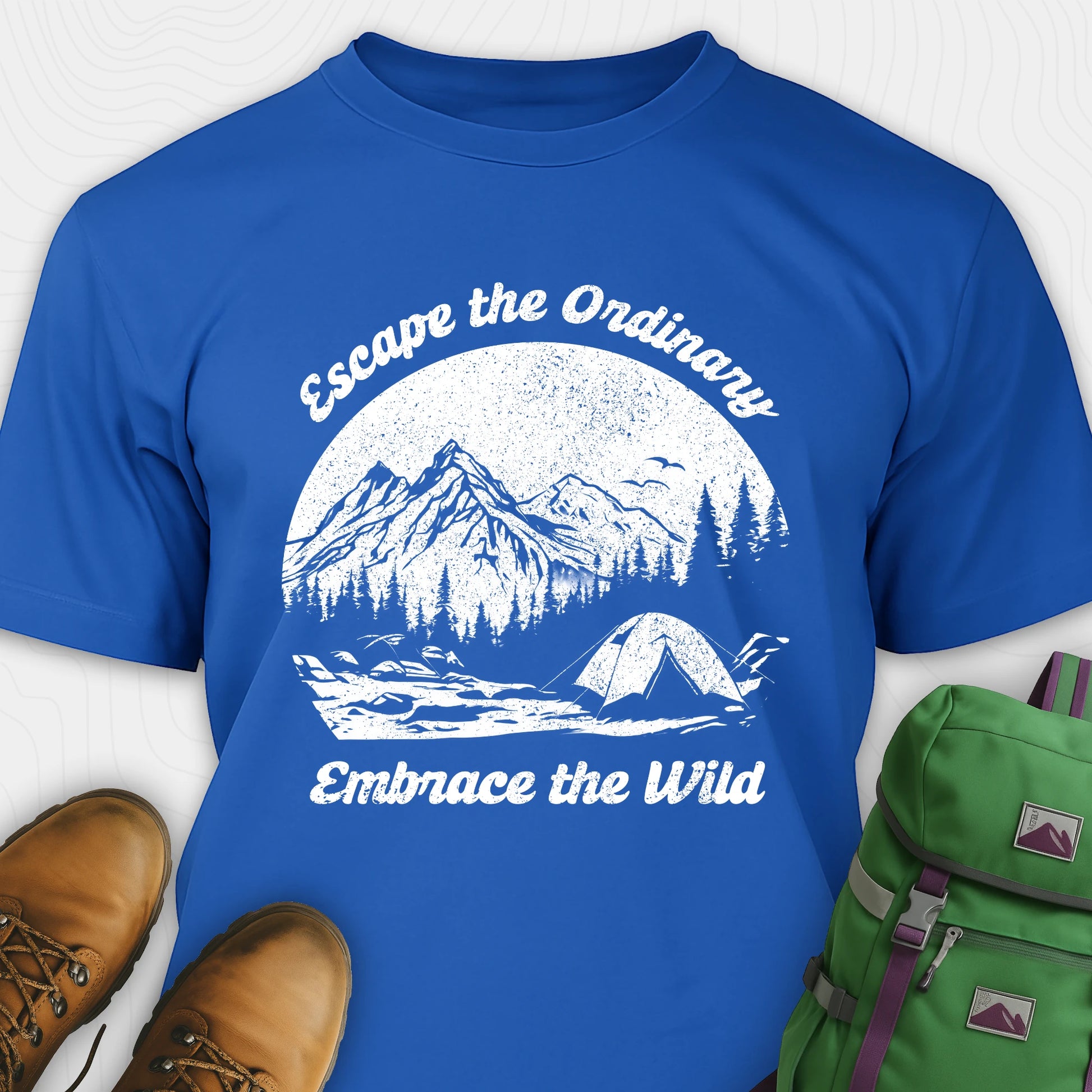 Blue escape the ordinary t-shirt with mountain and tent graphic
