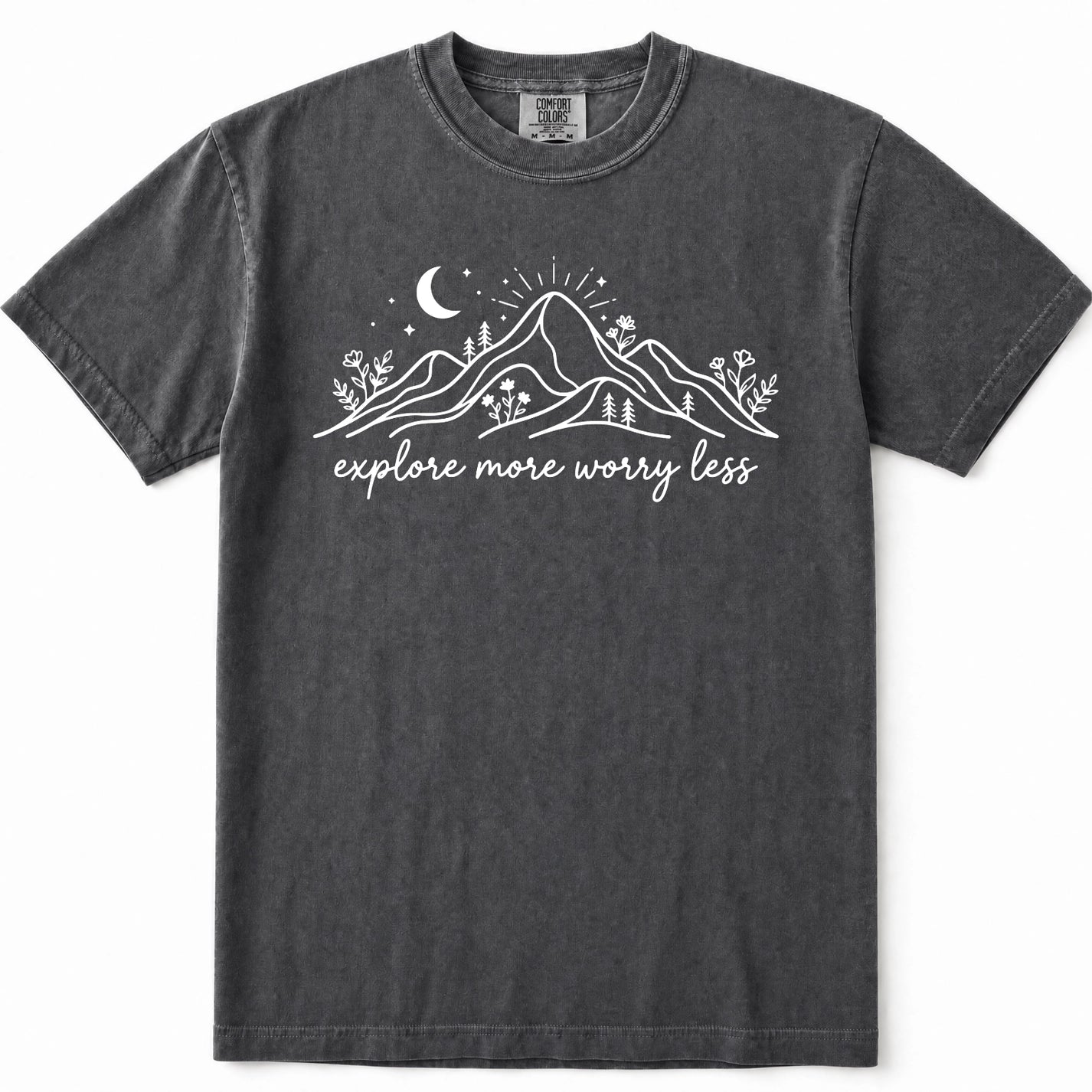 Pepper mineral-wash t-shirt with a white graphic of mountains, a crescent moon, and the text 'explore more worry less' printed on the chest.