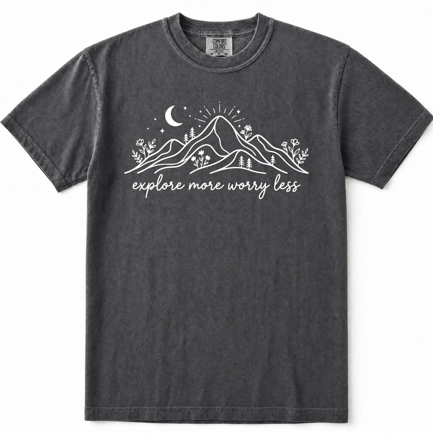 Pepper mineral-wash t-shirt with a white graphic of mountains, a crescent moon, and the text 'explore more worry less' printed on the chest.