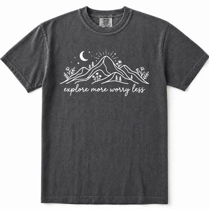 Pepper mineral-wash t-shirt with a white graphic of mountains, a crescent moon, and the text 'explore more worry less' printed on the chest.