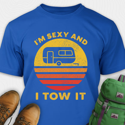 Blue trailer shirt with retro camper and sunset graphic, and "I'm sexy and I tow it" text