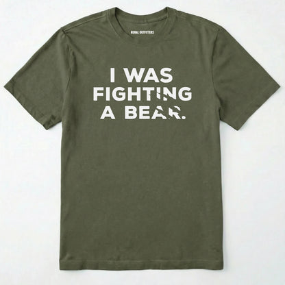 Military Green i was fighting a bear shirt with a bear scratch mark graphic on a white background.