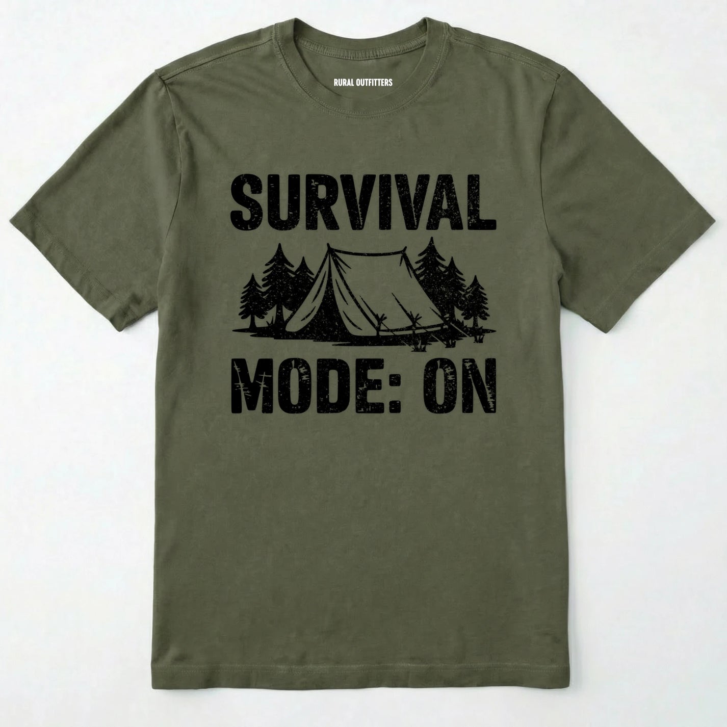 Military Green bushcraft shirt with survival mode on text, featuring a tent and a pine tree design on a white background.