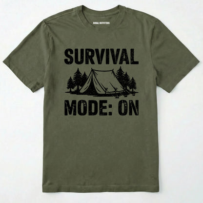 Military Green bushcraft shirt with survival mode on text, featuring a tent and a pine tree design on a white background.