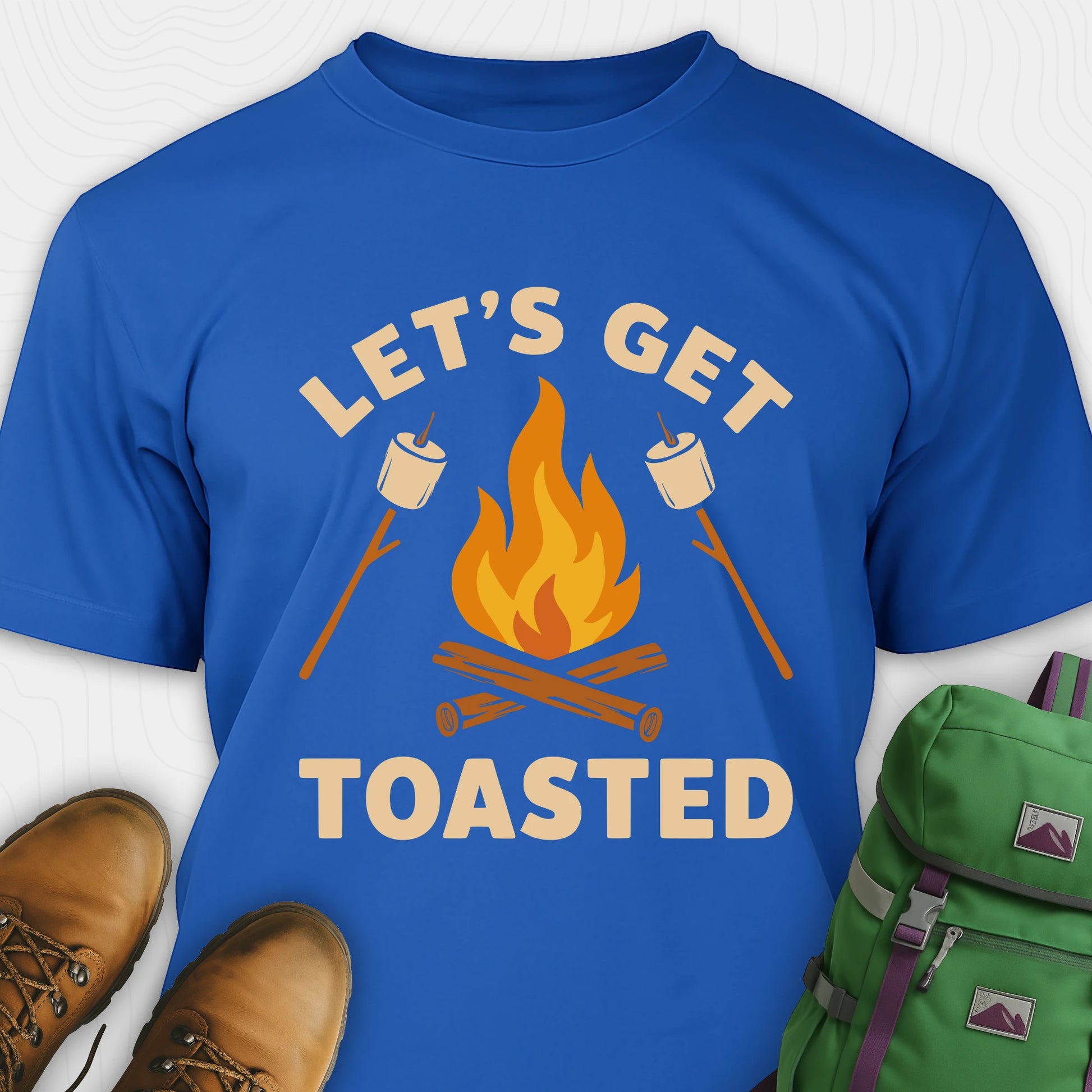 Blue let’s get toasted shirt with campfire and roasting marshmallow graphic