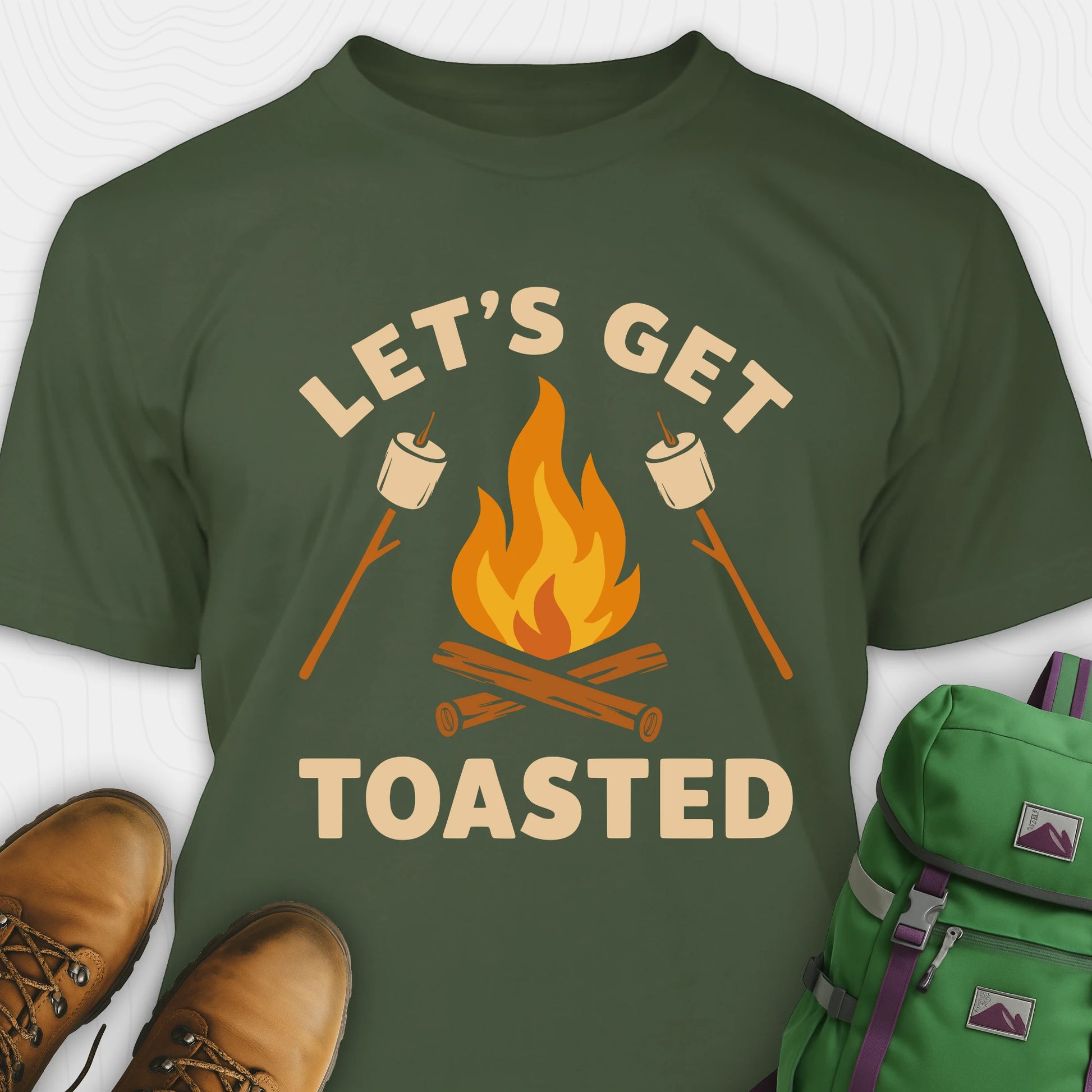 Green let’s get toasted shirt with campfire and roasting marshmallow graphic