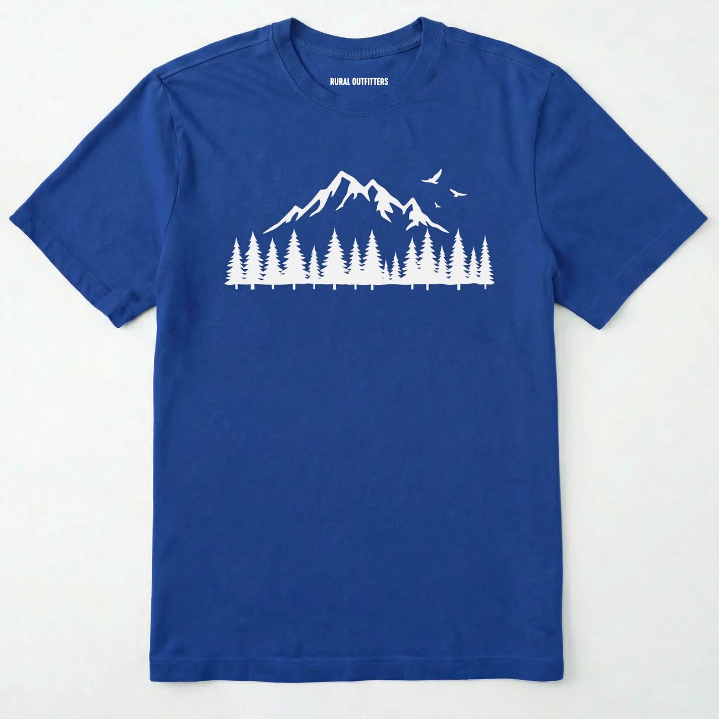Royal wild t-shirt with a minimalist mountain and pine tree graphic on a white background.