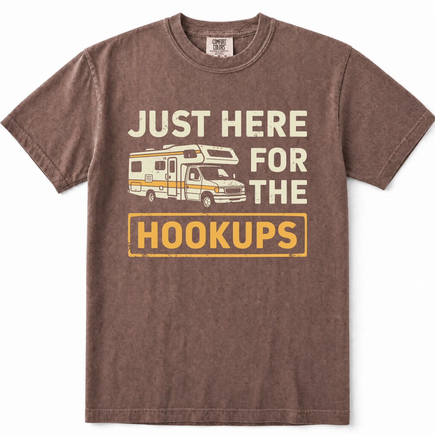 Espresso graphic t-shirt featuring a vintage-style camper van illustration and the text 'JUST HERE FOR THE HOOKUPS' in cream and yellow.