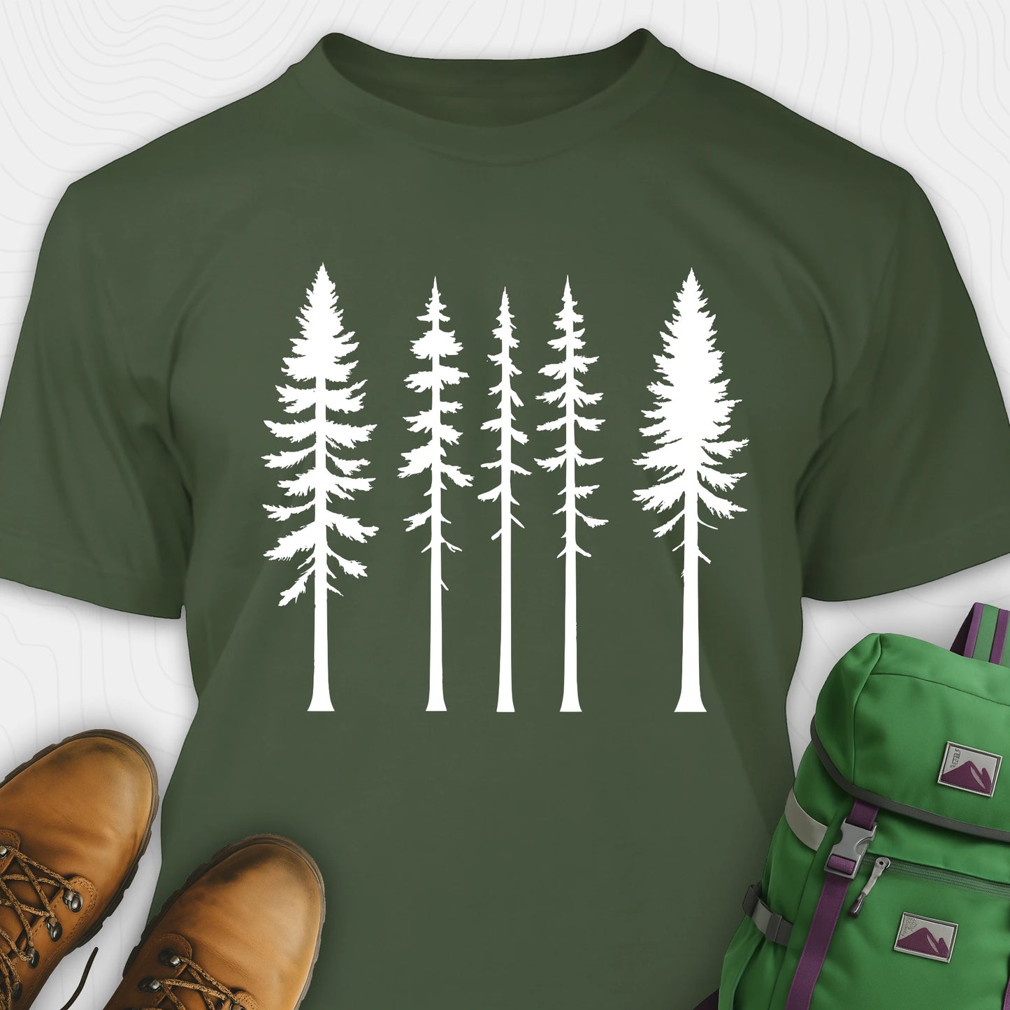 Green t-shirt with minimalist white tree silhouettes