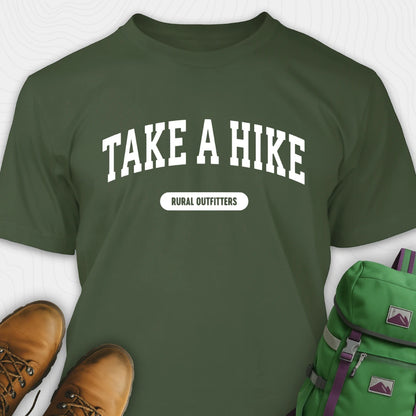 Green t-shirt with 'Take a Hike' text, brown boots, and green backpack on a white background
