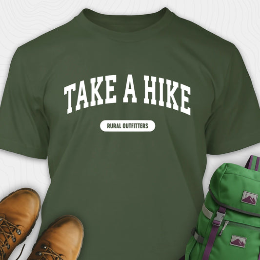 Green t-shirt with 'Take a Hike' text, brown boots, and green backpack on a white background