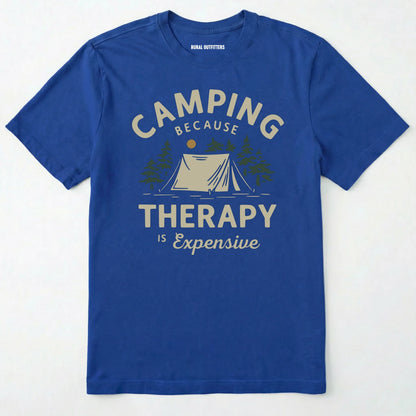 Royal camping therapy shirt with a tent and pine trees design and "camping because therapy is expensive" text on a white background.