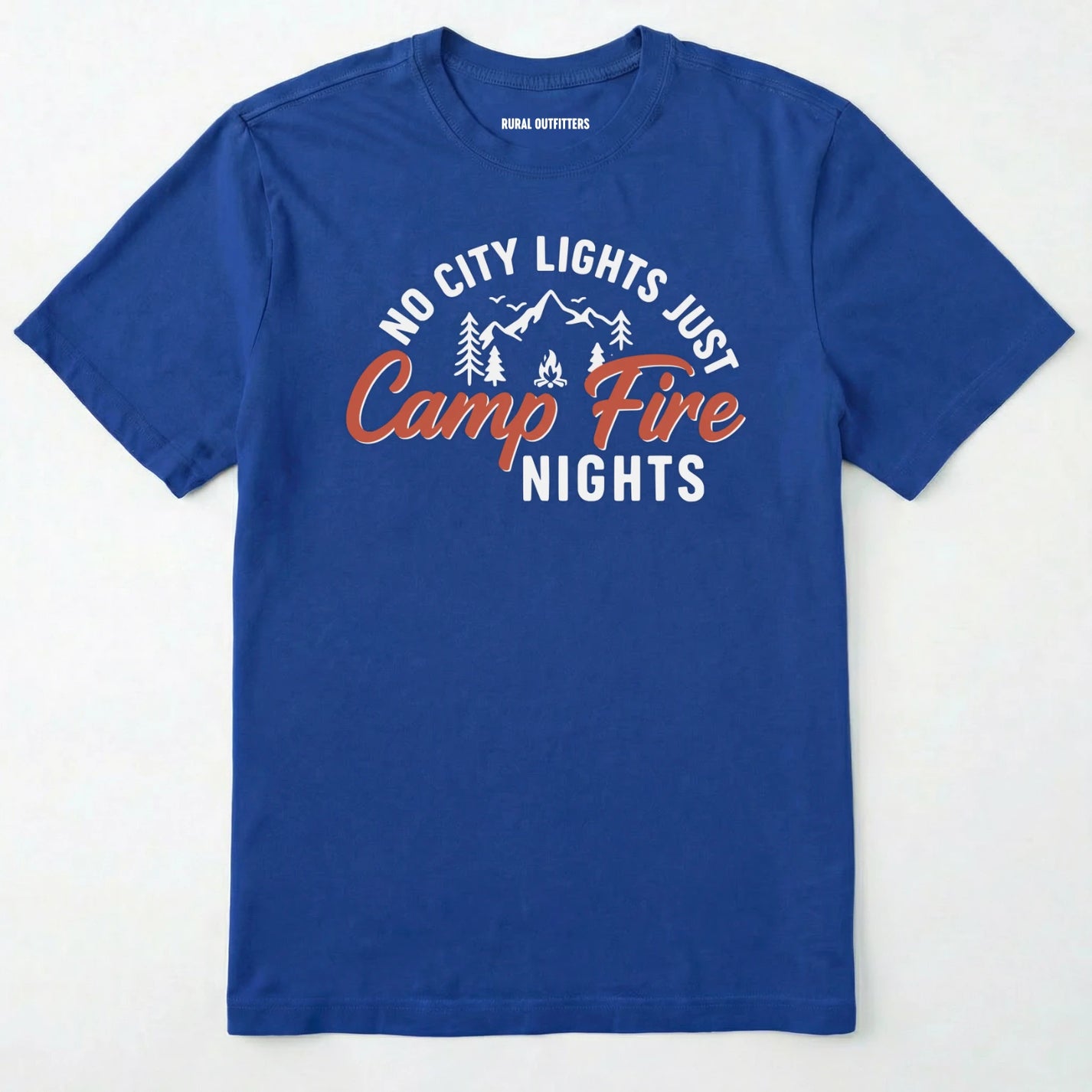 Royal campfire shirt with mountains and trees design and "no city lights just campfire nights" text on a white background.