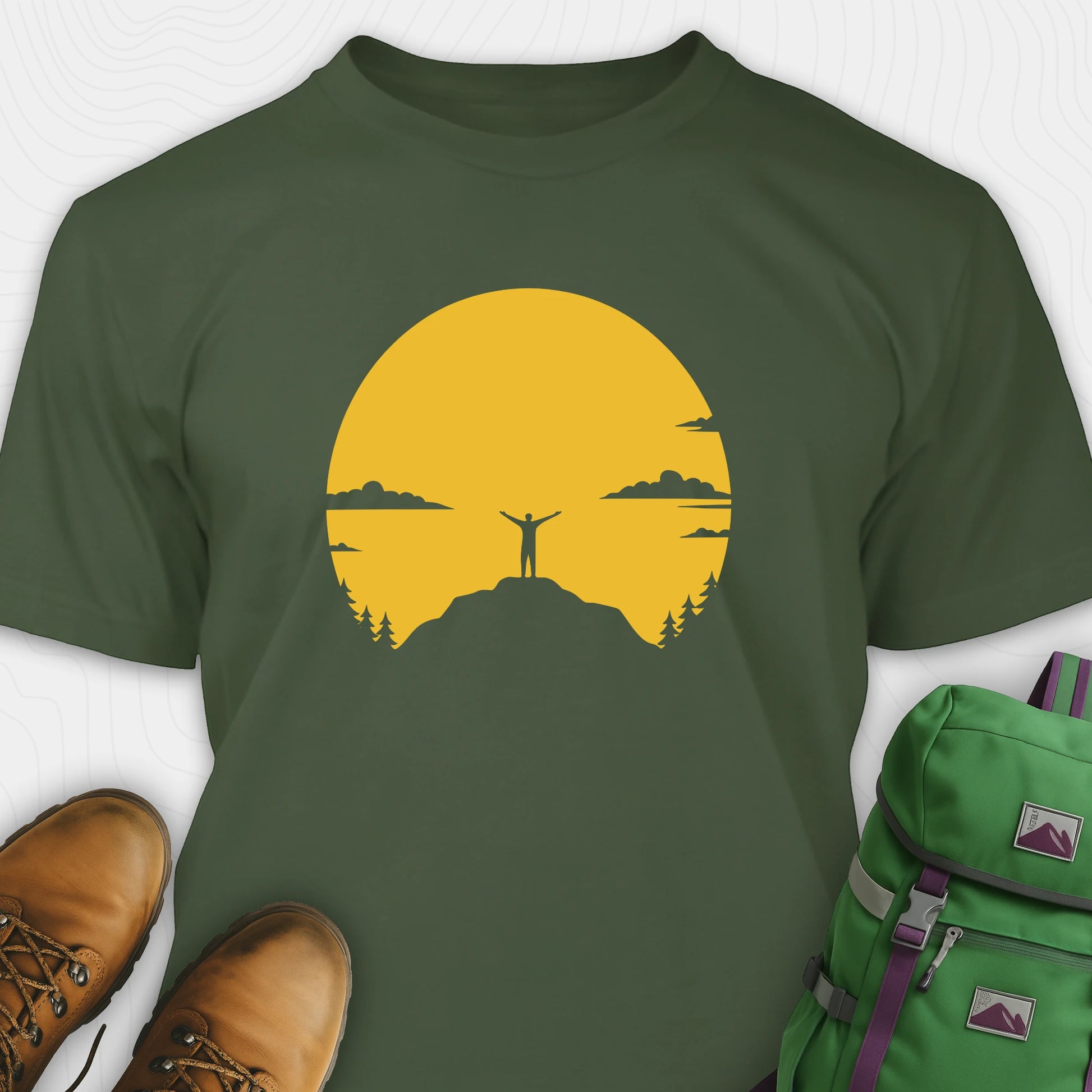 Green climbing shirt with yellow sunset and mountain climber silhouette