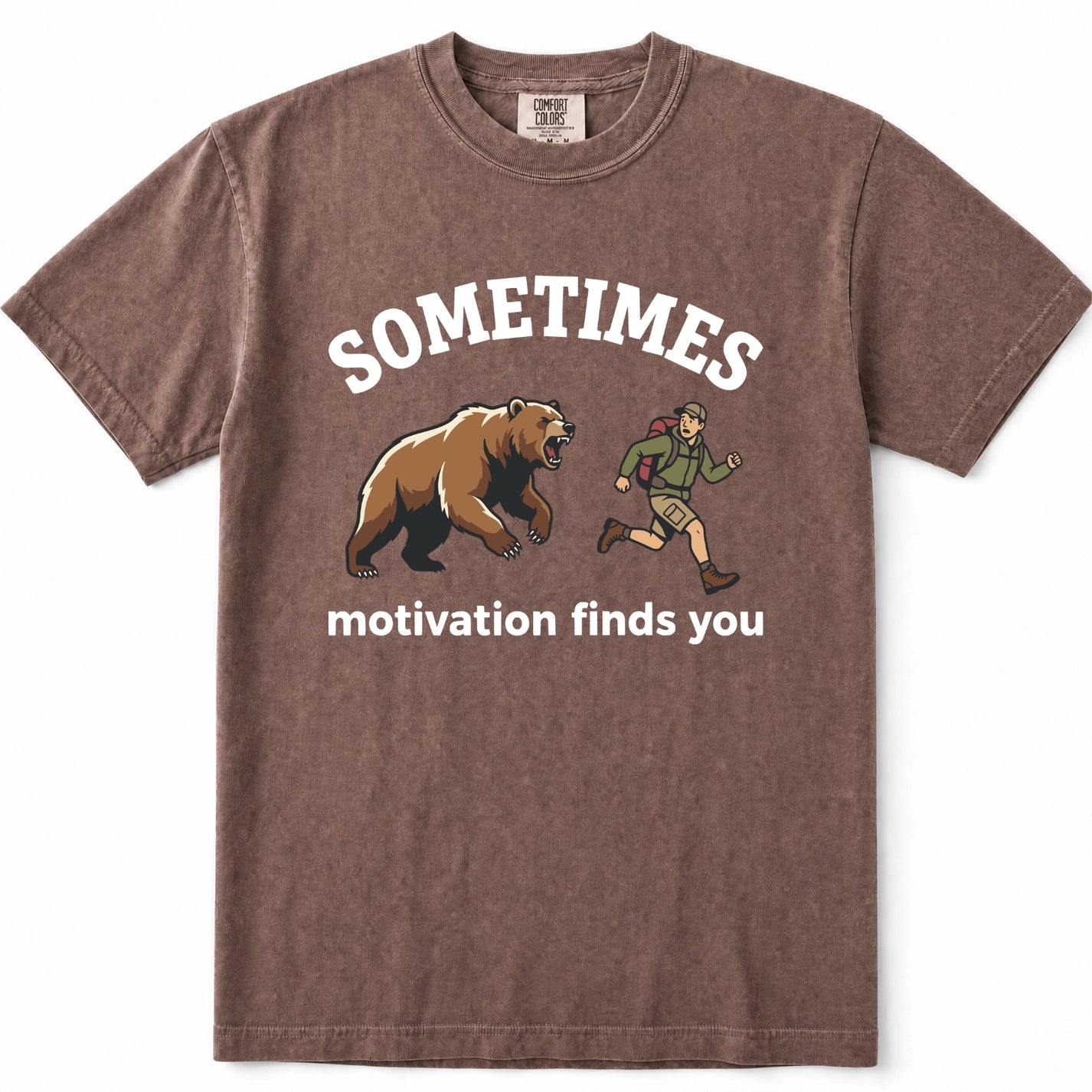 Espresso acid-wash graphic t-shirt featuring a brown bear and a hiking hiker with the text 'SOMETIMES motivation finds you' printed on the front.