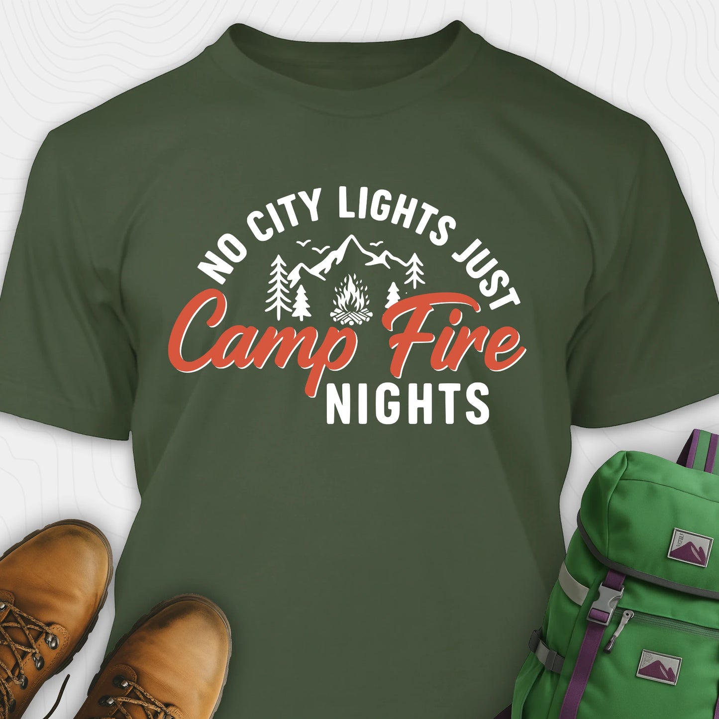 Green campfire shirt with mountains and trees design and "No city lights just campfire nights" text