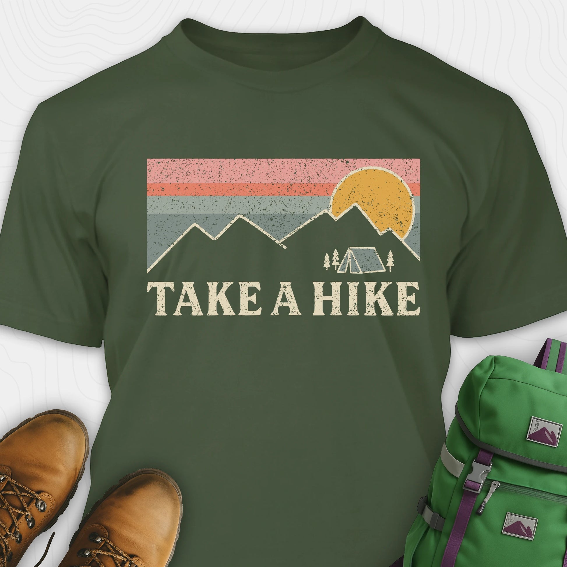 Green take a hike shirt with retro sunset and mountain graphic
