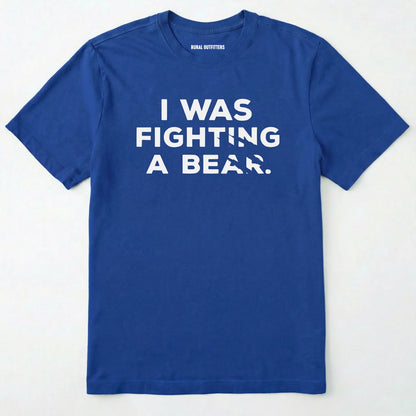 Royal i was fighting a bear shirt with a bear scratch mark graphic on a white background.