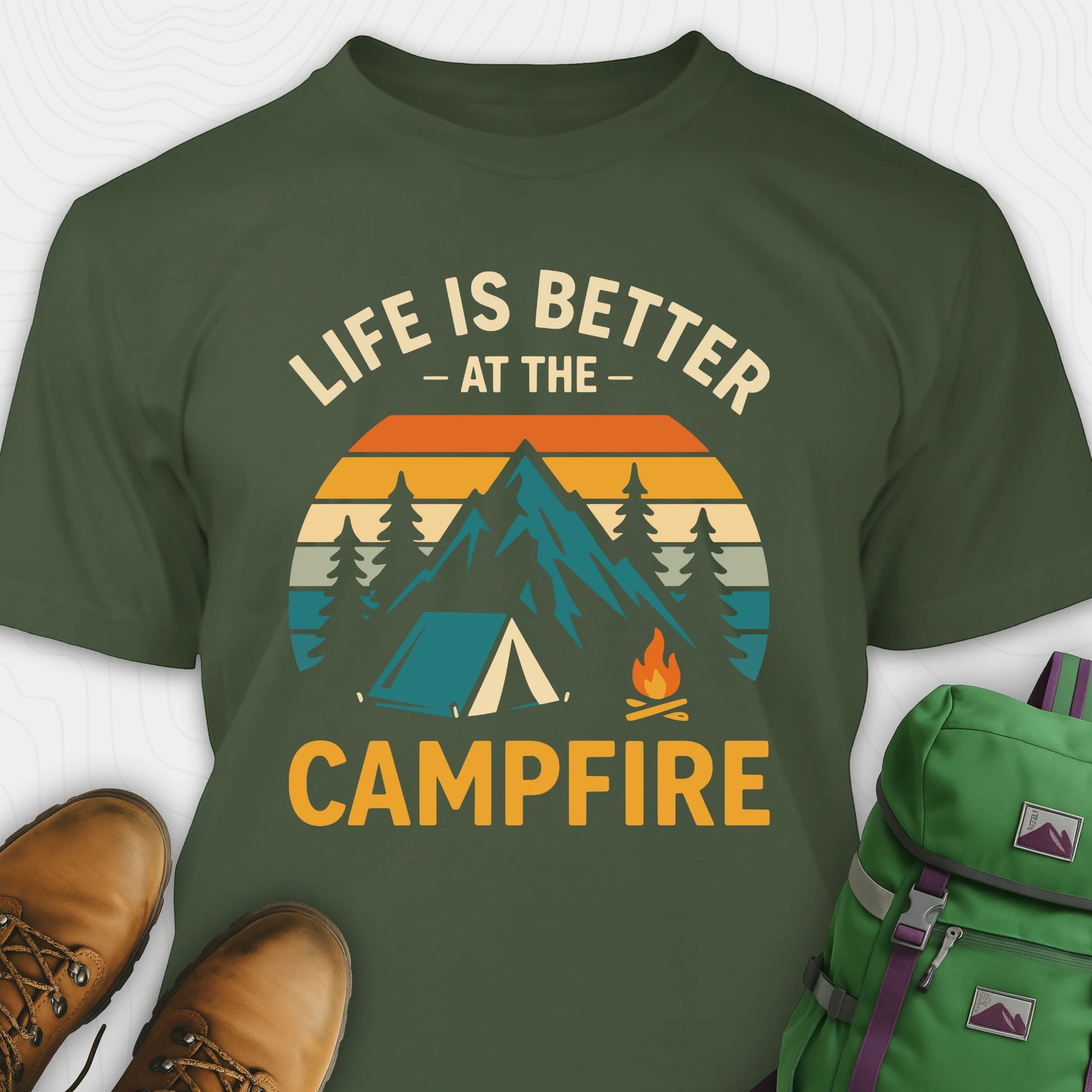 Green life is better around the campfire shirt with tent, campfire, sunset and retro mountain graphic design
