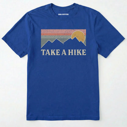 Royal take a hike shirt with retro sunset and mountain graphic on a white background.