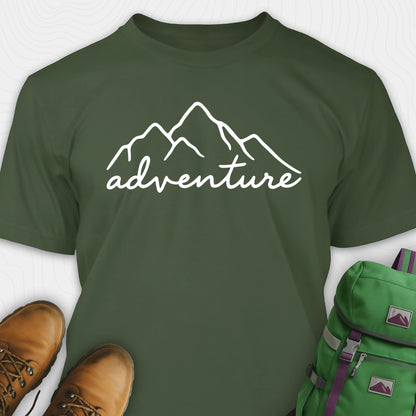 Green adventure shirt with mountain design and 'adventure' text, paired with brown boots and a green backpack.