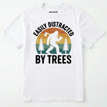 White funny sasquatch shirt featuring bigfoot silhouette and trees on a white background.