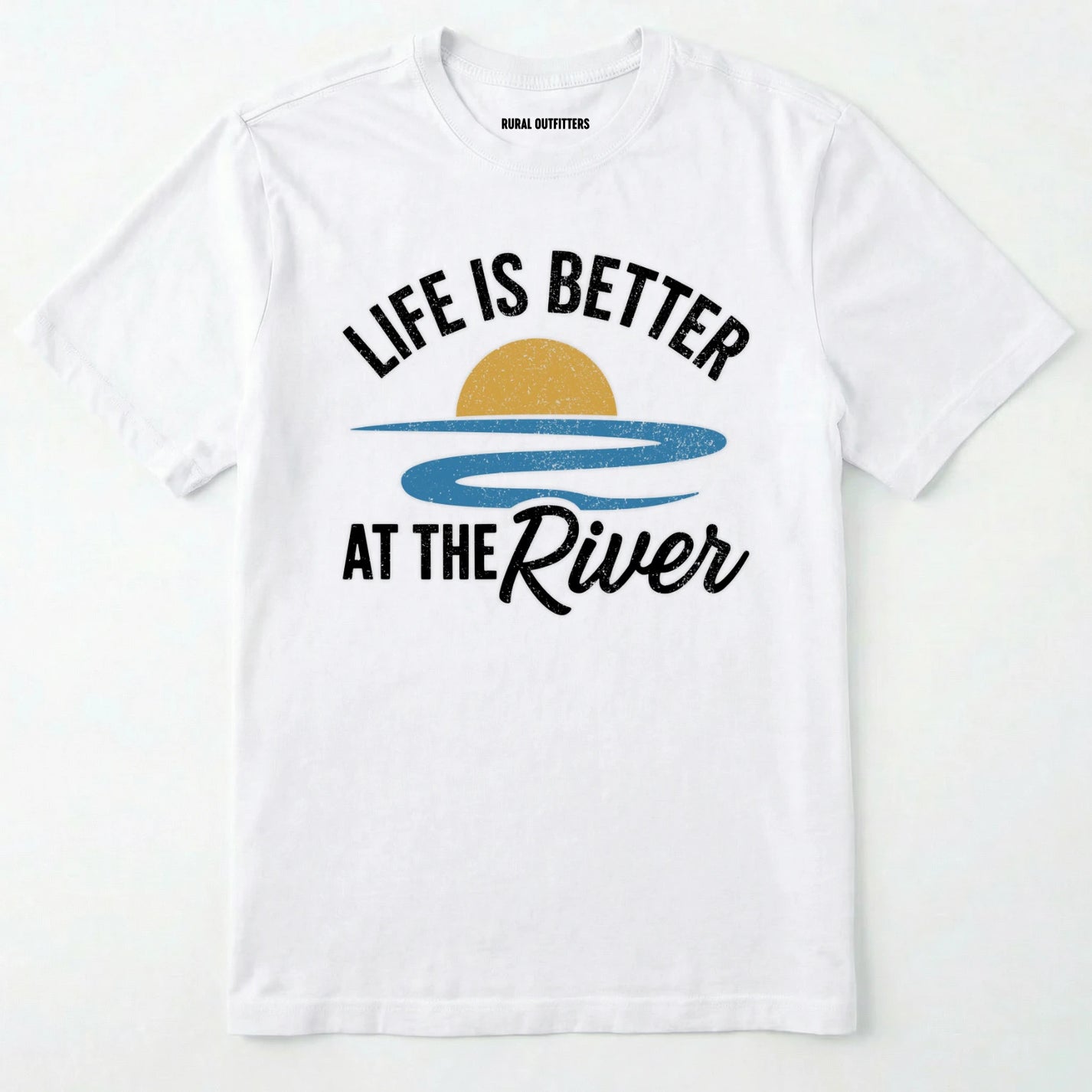 White river shirt with 'life is better at the river' design, paired with brown boots and a green backpack on a light grey background.