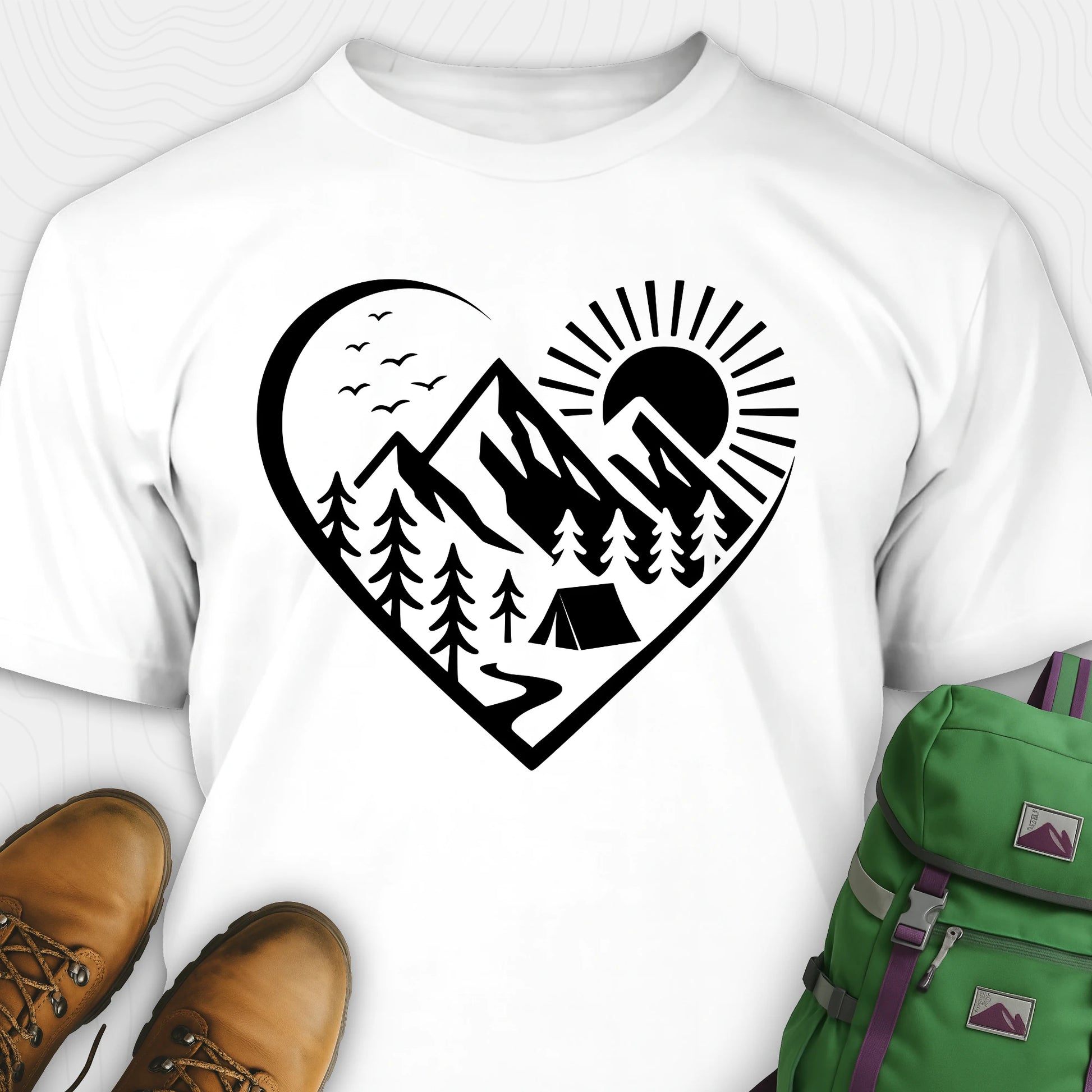 White nature t-shirt featuring heart graphic with mountains, trees, and tent illustration