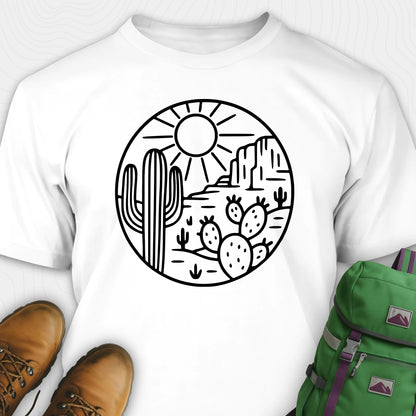 White cactus shirt featuring desert landscape and cactus illustration