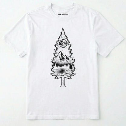 White tree t-shirt featuring a detailed white graphic of a pine tree silhouette. the tree outline contains a landscape scene: a mountain peak rising over a forested shoreline, with its reflection visible in a lake below. above the mountain is a starry night sky and a full or partial circle representing the moon or sun.