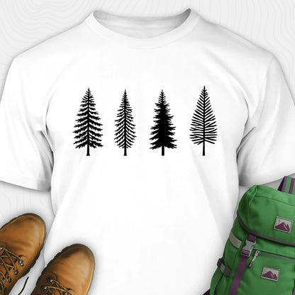 White pine tree shirt with black minimalist forest graphic, brown boots, and a green backpack on a light gray background