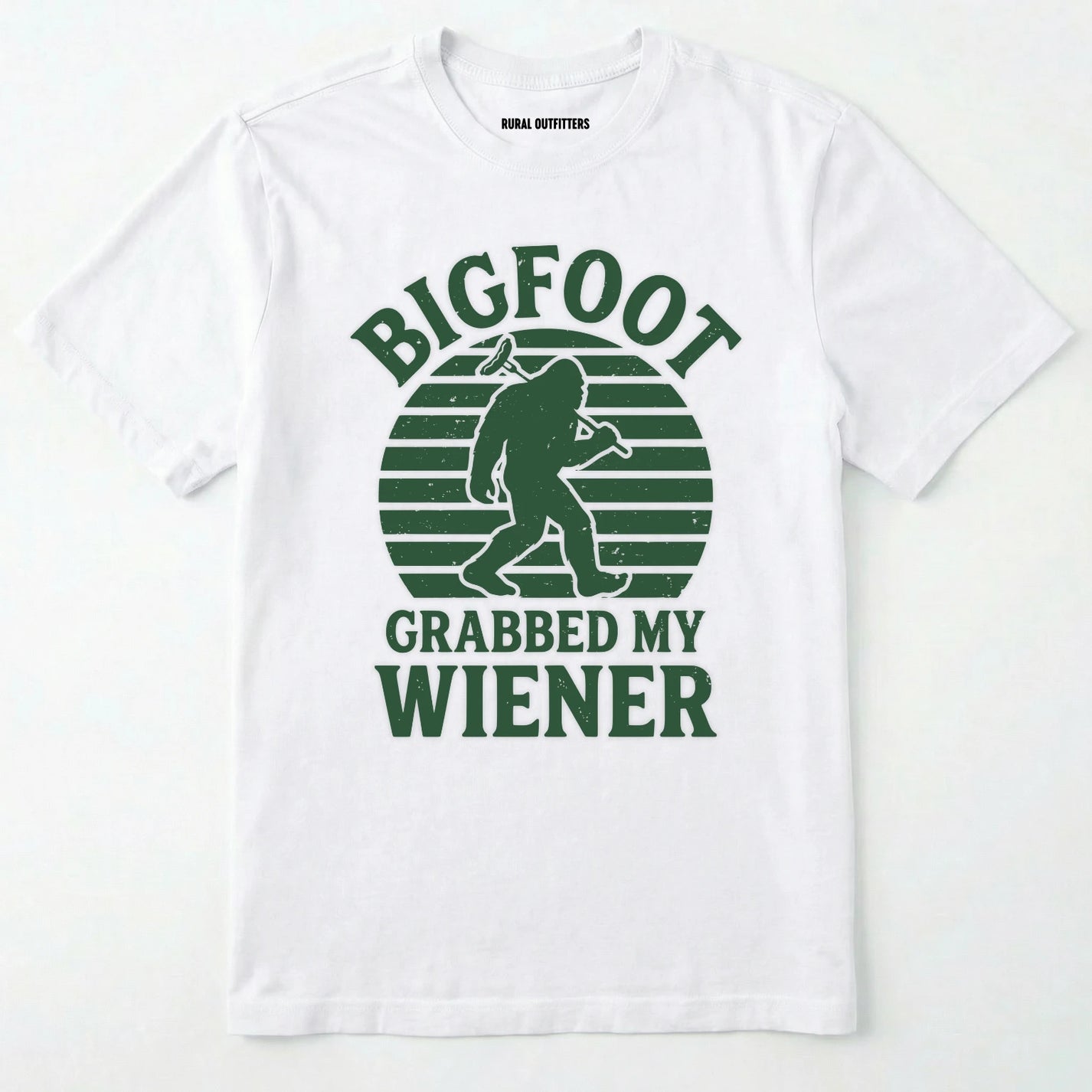 White bigfoot grabbed my wiener t-shirt with a funny design and text, on a plain white background.