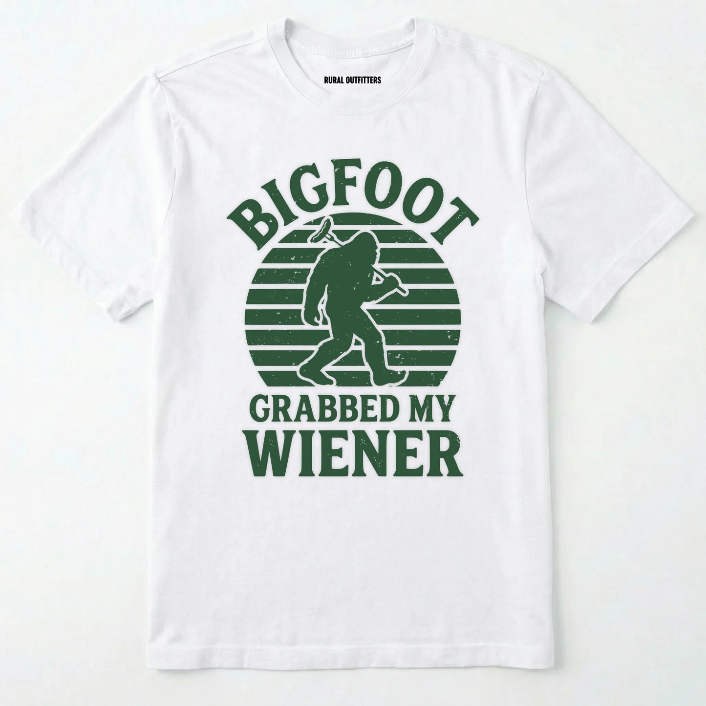 White bigfoot grabbed my wiener t-shirt with a funny design and text, on a plain white background.