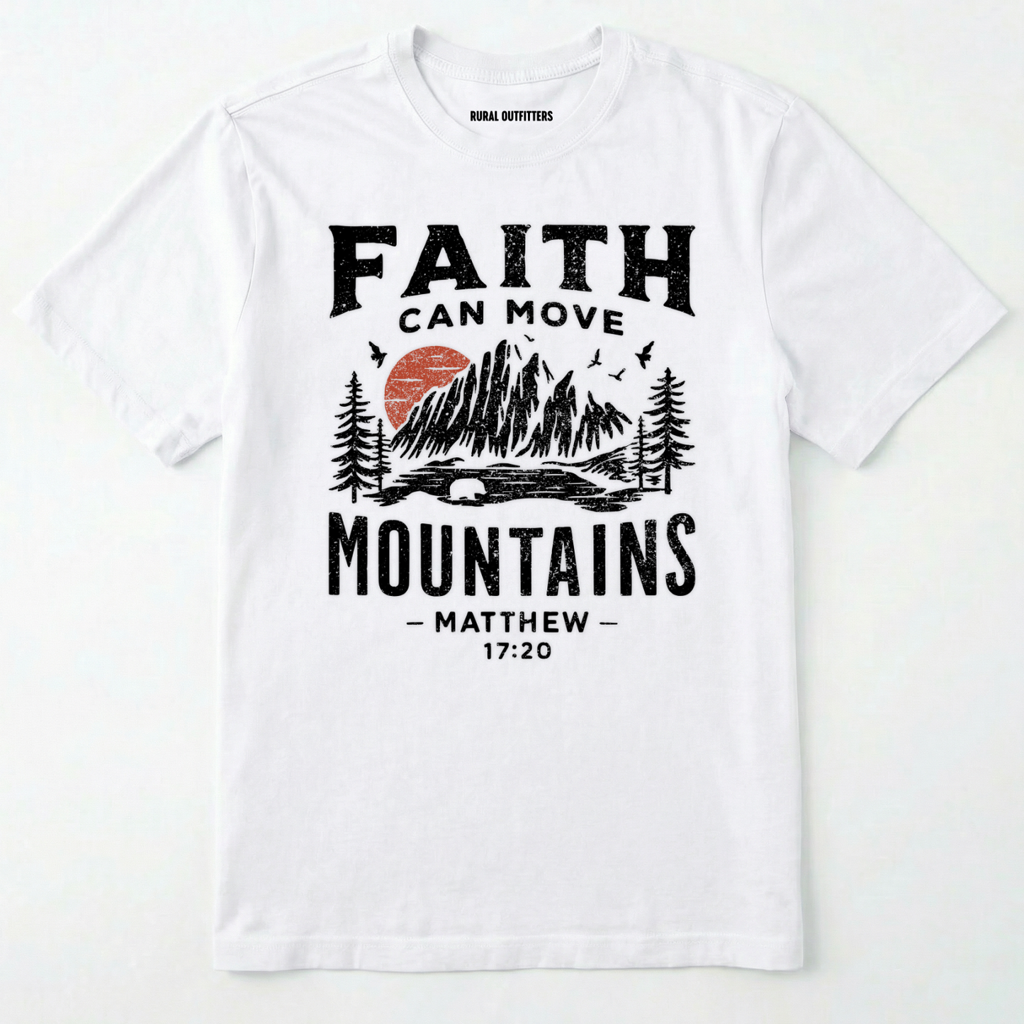 White bible verse t-shirt with 'faith can move mountains' text with outdoor graphic design on a white background.