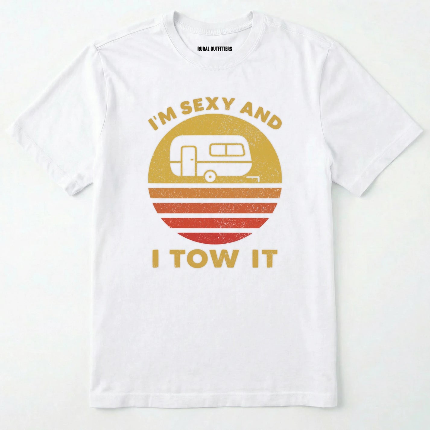 White trailer shirt with retro camper and sunset graphic, and "i'm sexy and i tow it" text on a white background.