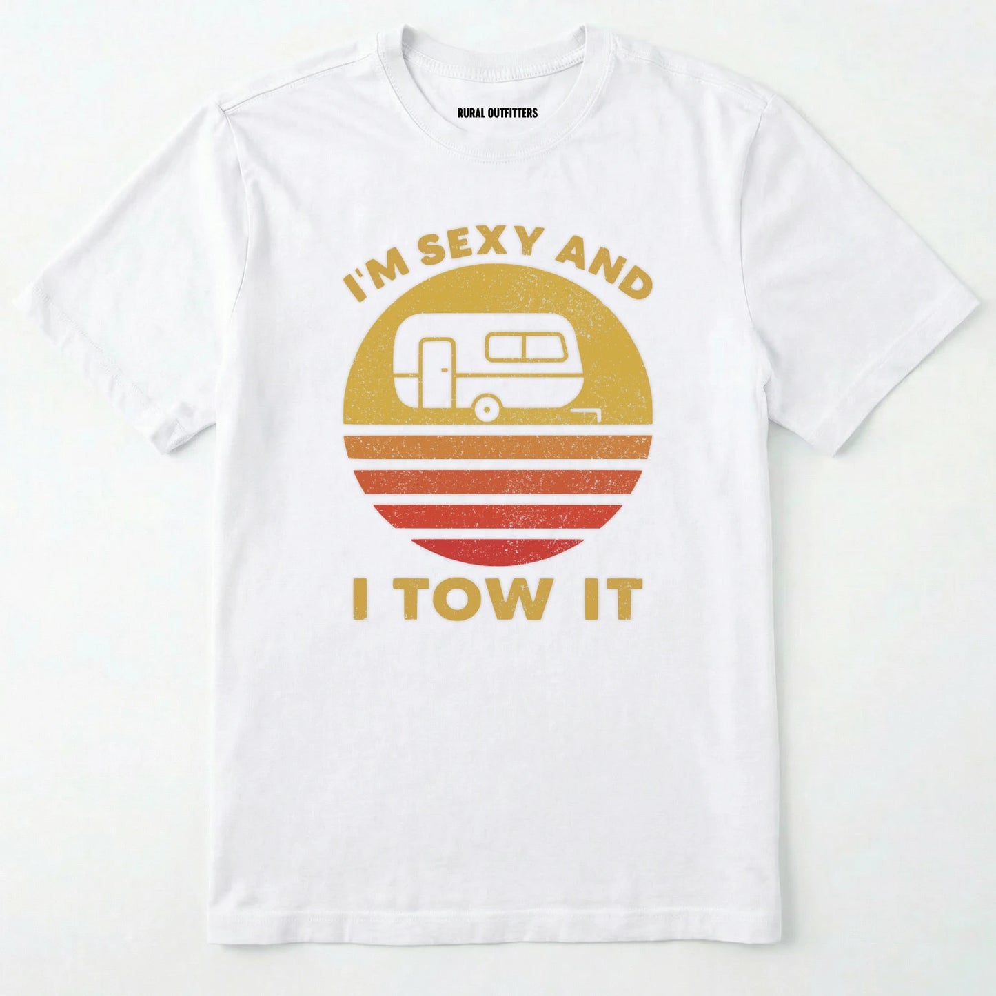 White trailer shirt with retro camper and sunset graphic, and "i'm sexy and i tow it" text on a white background.