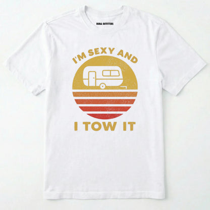 White trailer shirt with retro camper and sunset graphic, and "i'm sexy and i tow it" text on a white background.