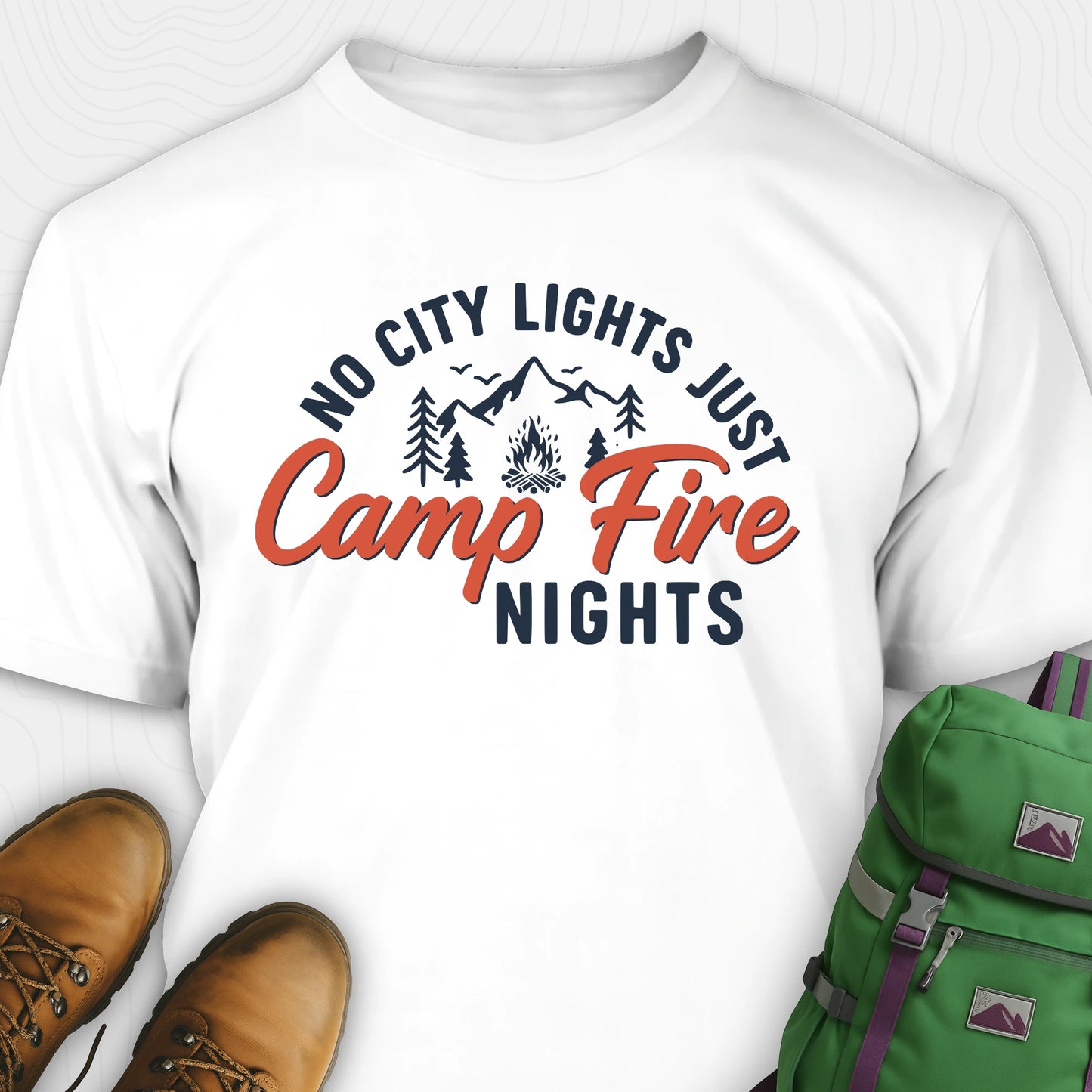 White campfire shirt with mountains and trees design and "No city lights just campfire nights" text