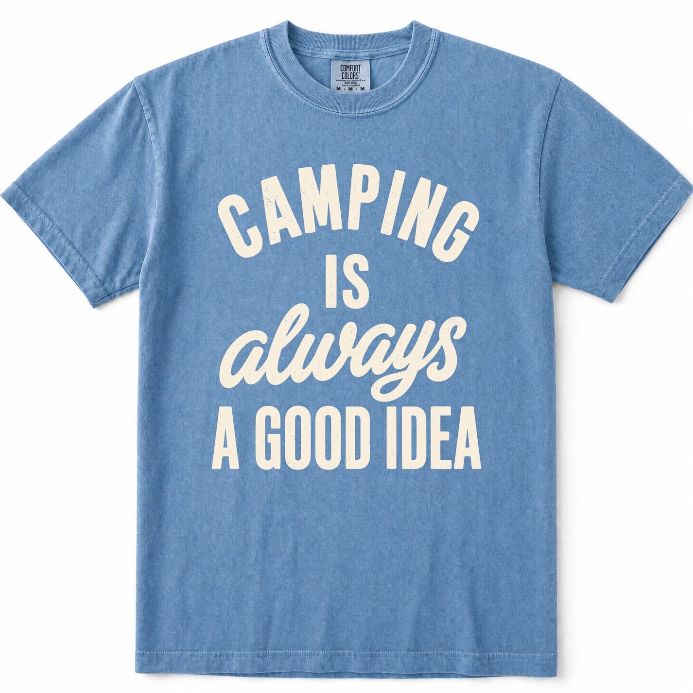 Blue Jean crewneck t-shirt with a distressed graphic on the front that reads 'CAMPING IS always A GOOD IDEA' in cream-colored lettering, displayed flat against a white background.
